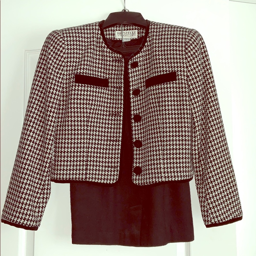 Black and white suit jacket with black skirt